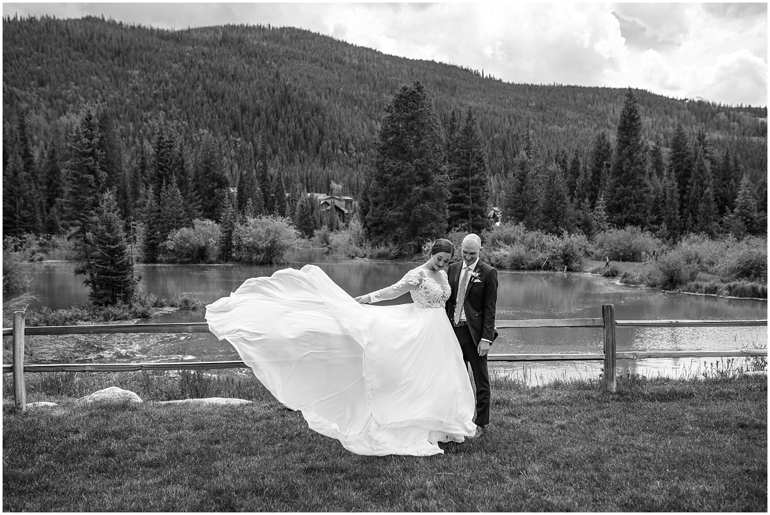 Bride throws her skirt in the wind at Ski Tip Lodge wedding in Keystone Colorado