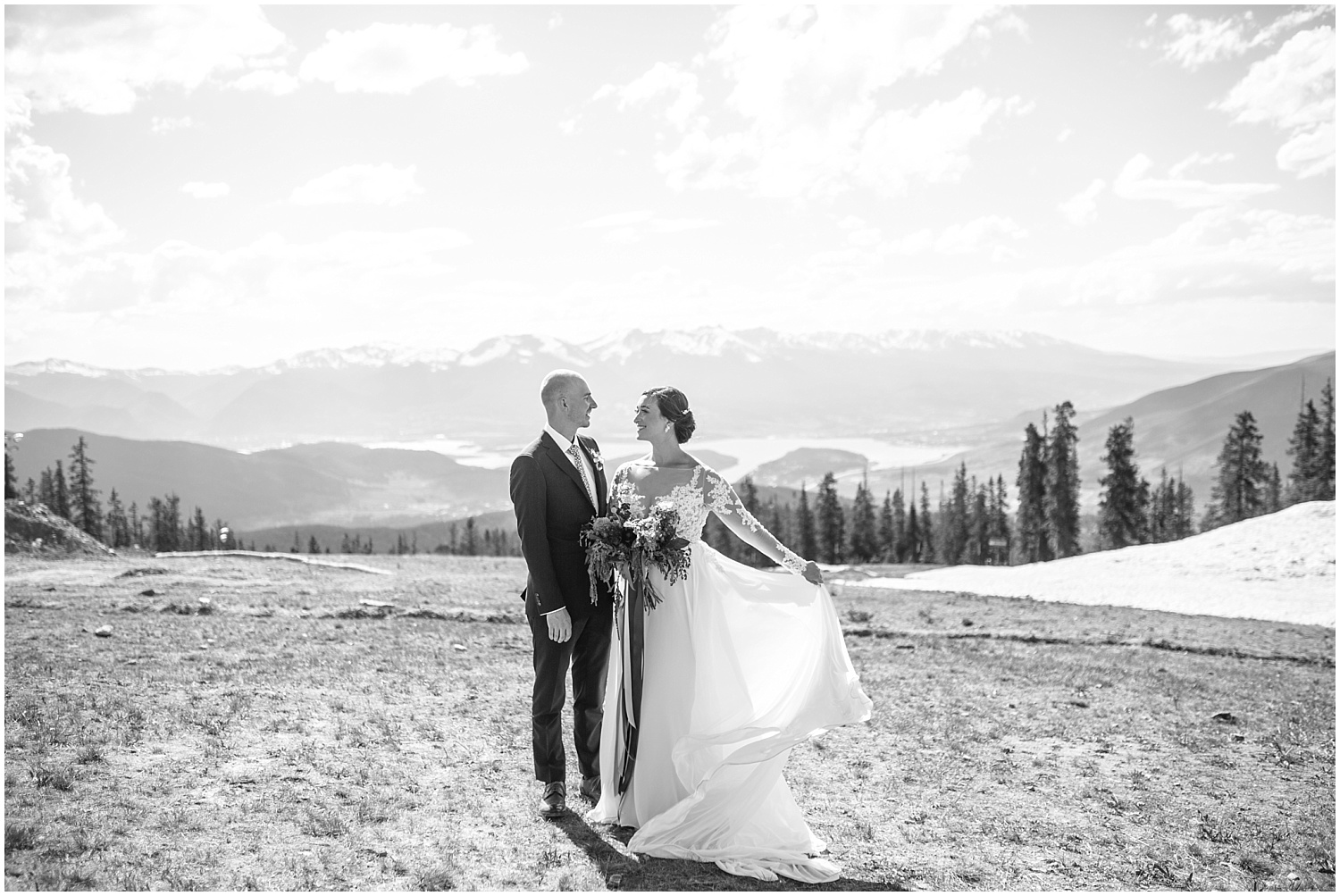 Black and white bride and groom portrait at summit of Keystone Colorado