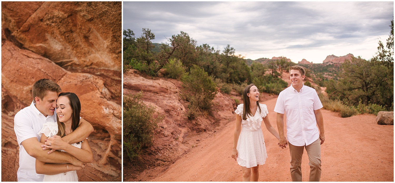 Couple walking along dirt road for Garden of the Gods engagement pictures