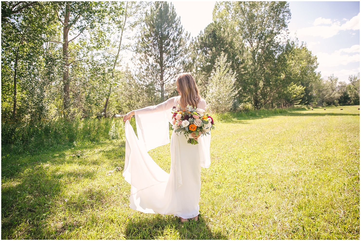Bridal portrait with long-sleeved wedding dress by Shareen Bridal at Lone Hawk Farm in Longmont Colorado