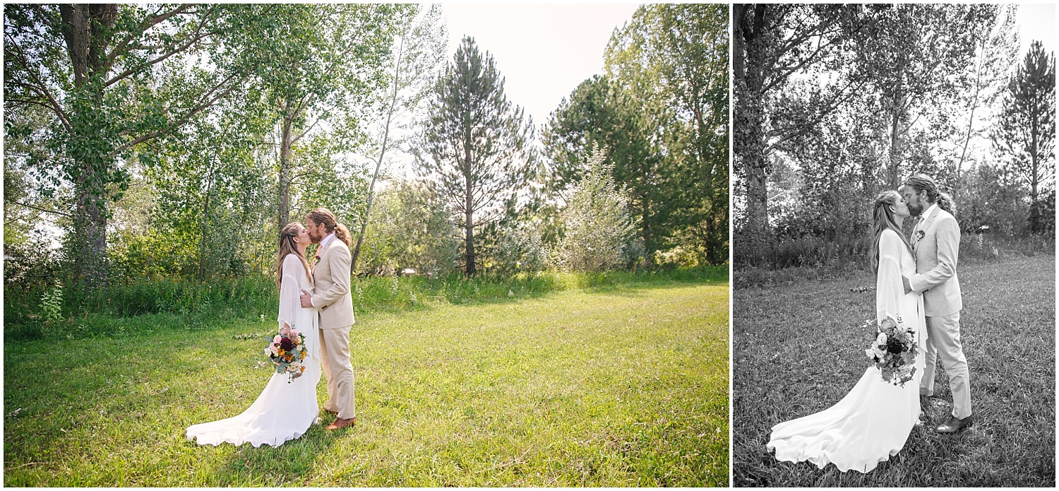 Bride and groom kiss in the fields at Lone Hawk Farm in Longmont Colorado