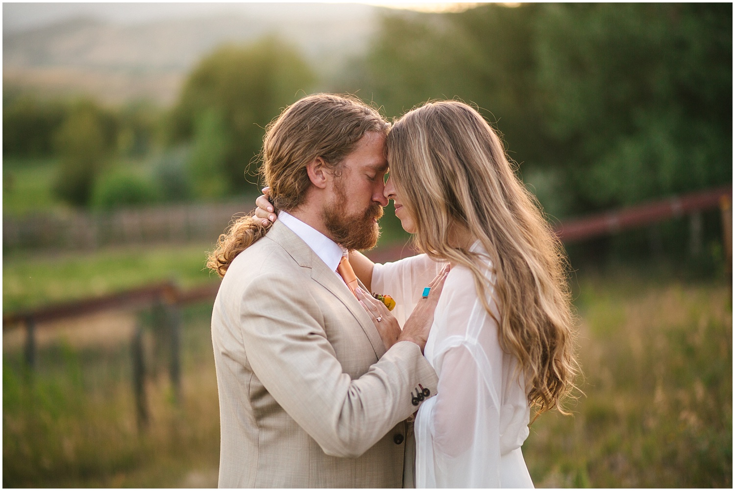 Bride and groom share a quiet moment at sunset at Lone Hawk Farm wedding in Longmont Colorado