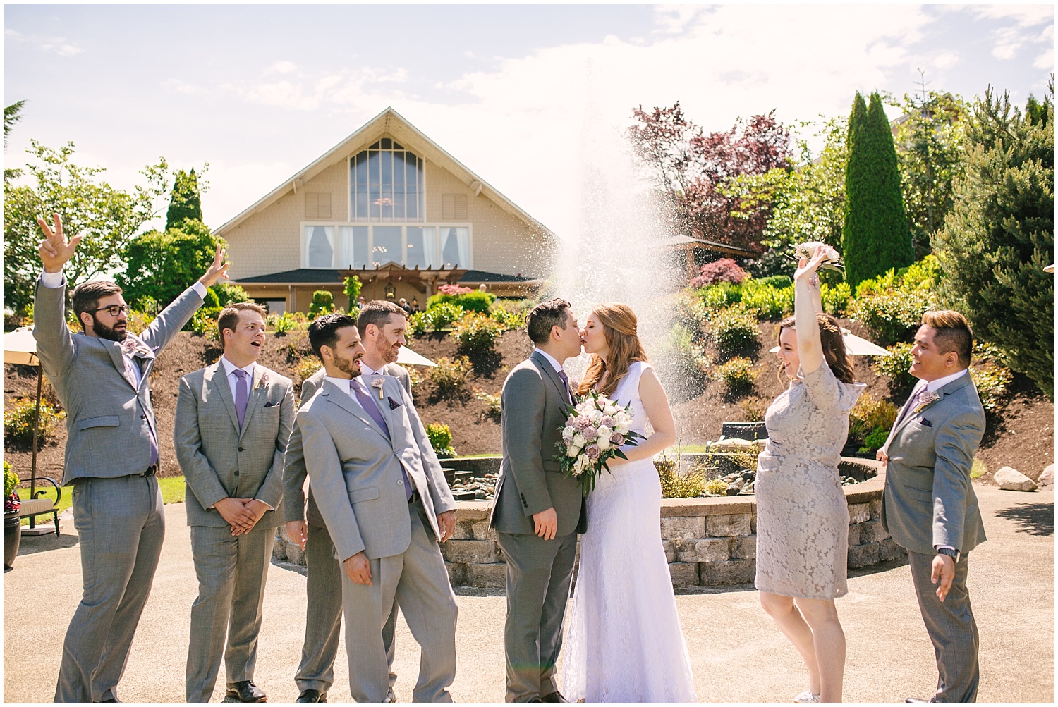 Wedding party cheers on the bride and groom at Lord Hill Farms wedding in Snohomish Washington