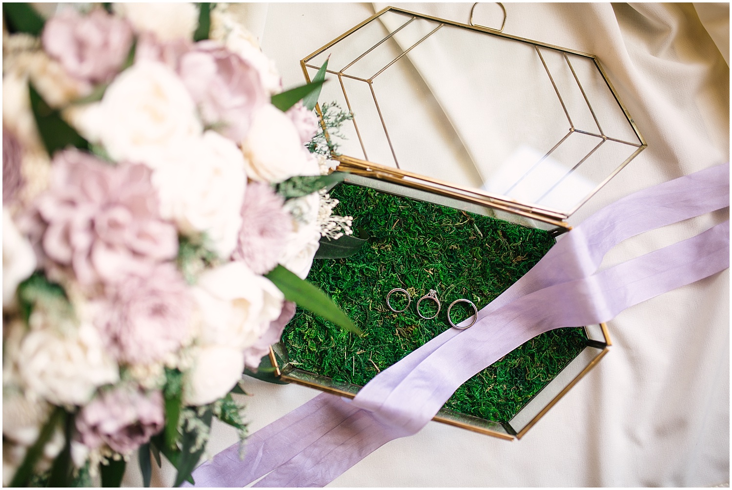 Gold geometric shaped box with wedding rings at Lord Hill Farms wedding