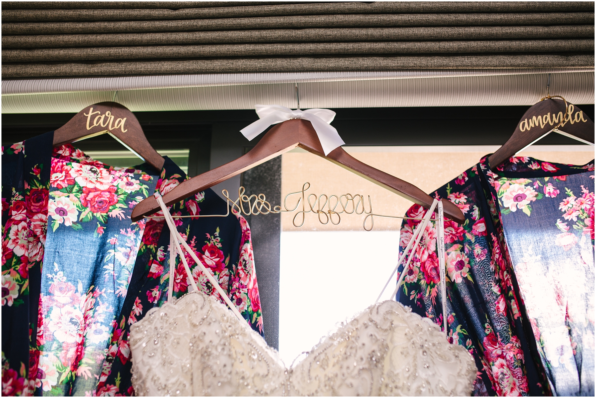 Wedding dress with floral bridesmaid robes at Issaquah wedding