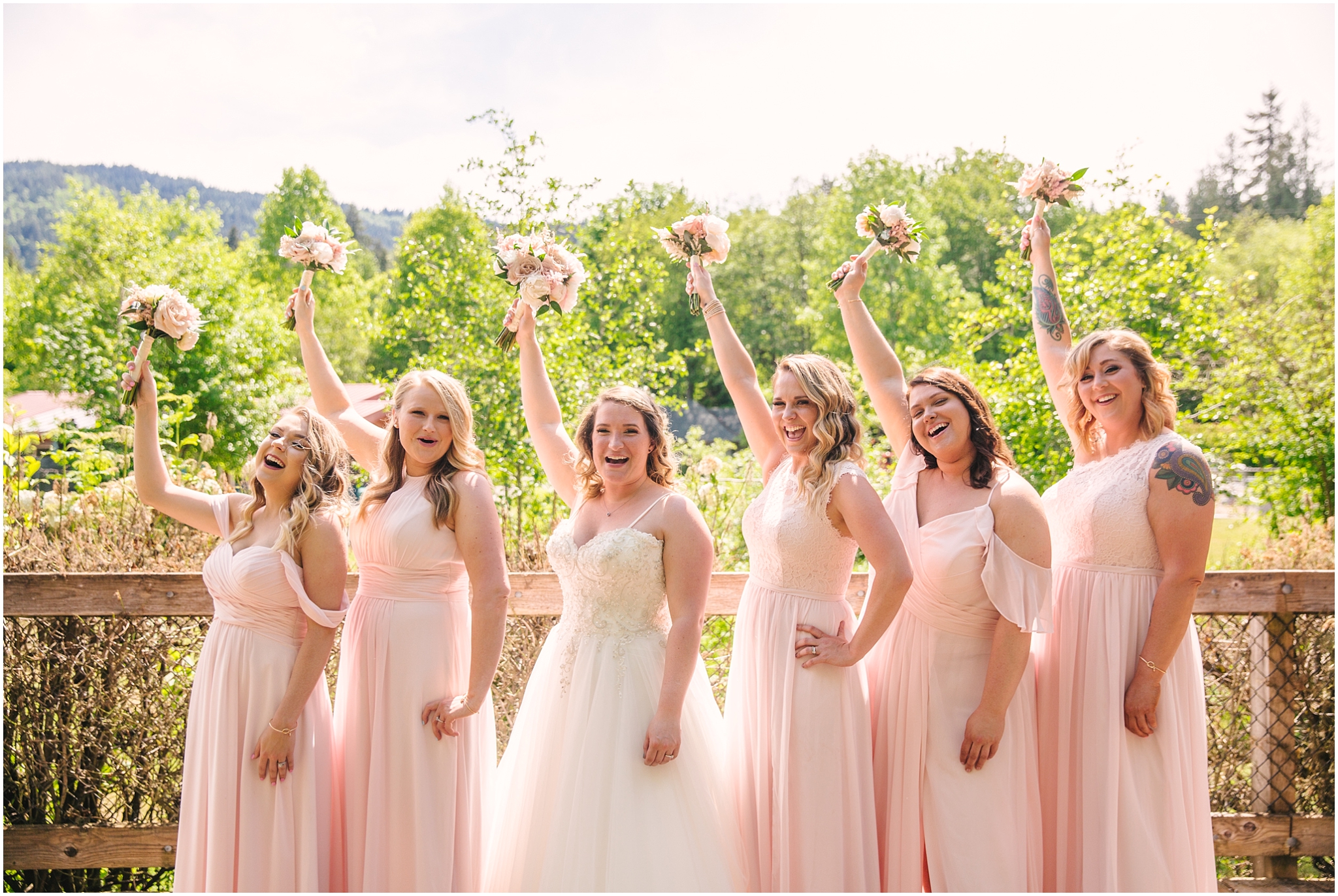 Soft pink bridesmaids at Issaquah Salmon Hatchery