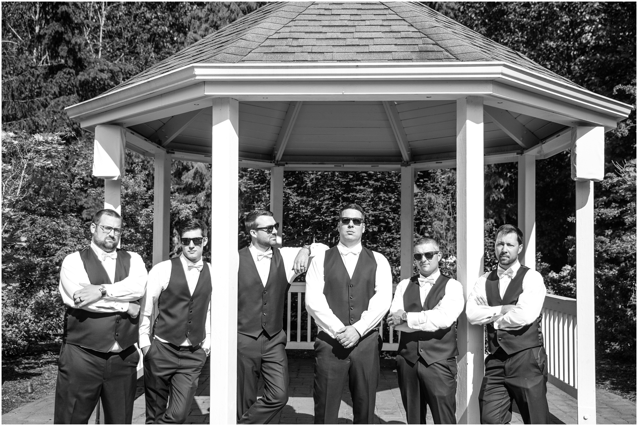 Black and white groomsmen portraits at Pickering Barn wedding in Issaquah Washington