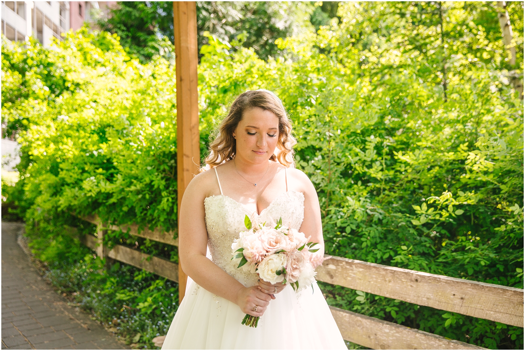 Bride with pink peony bouquet at Pickering Barn wedding in Issaquah Washington