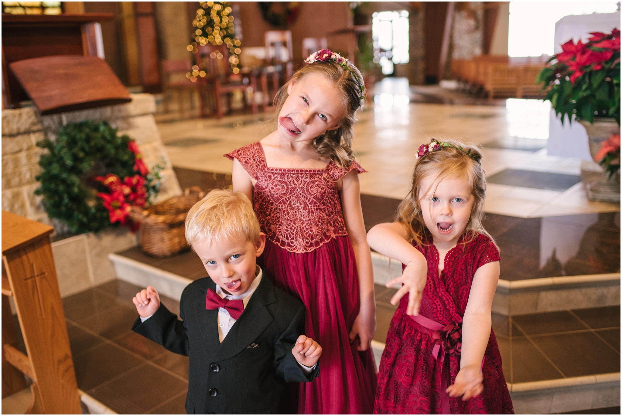 Flower girls and ring bearer at winter wedding at St Francis of Assisi Catholic Church