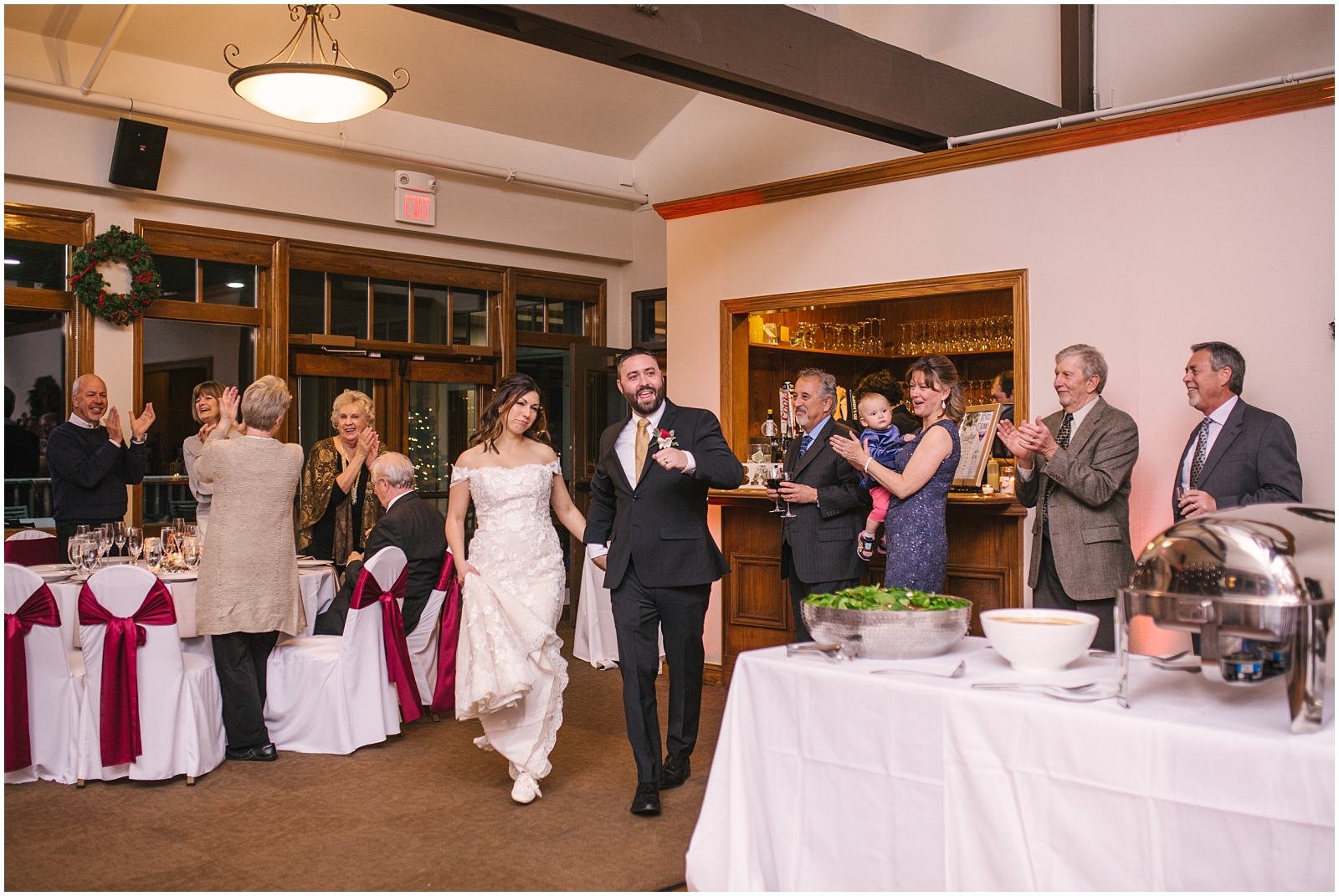 Bride and groom make grand entrance to winter wedding at Arrowhead Golf Club
