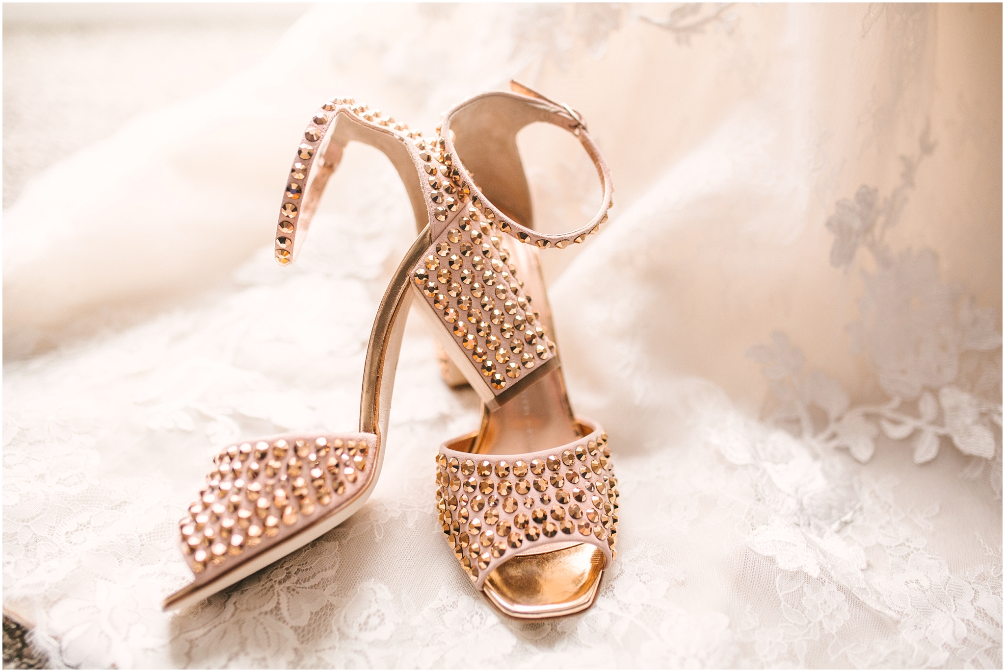 Bride's rose gold studded heels by Giuseppe Zanotti for winter wedding