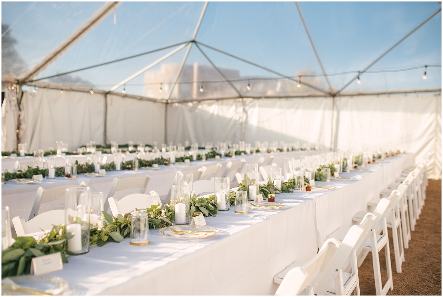 Eucalyptus, white candles, and gold lined dinnerware at backyard wedding in NE Albuquerque Acres