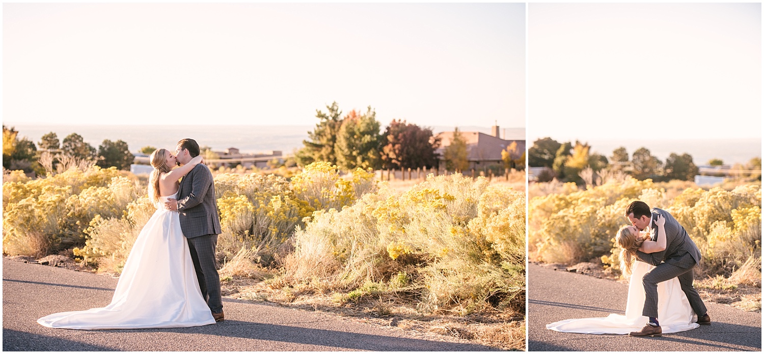 Bride and groom kissing by yellow blooming chamisa at sunset during fall backyard wedding in NE Albuquerque Acres