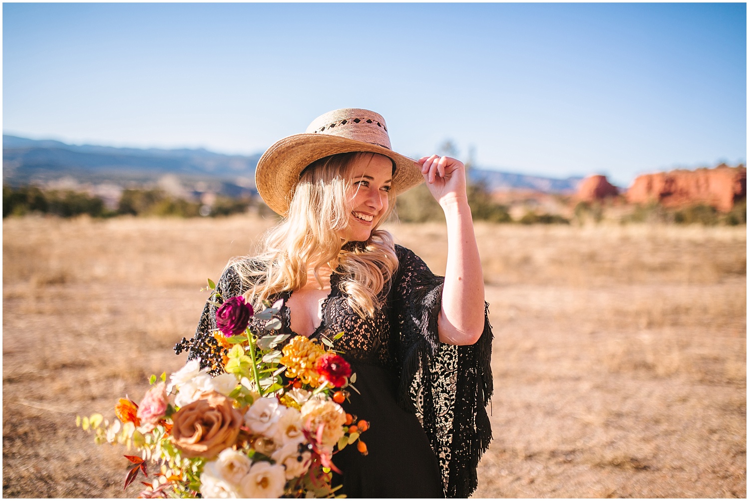 Southwest boho styled elopement photos in Jemez Red Rocks New Mexico. Flowers by Floriography and Florecita