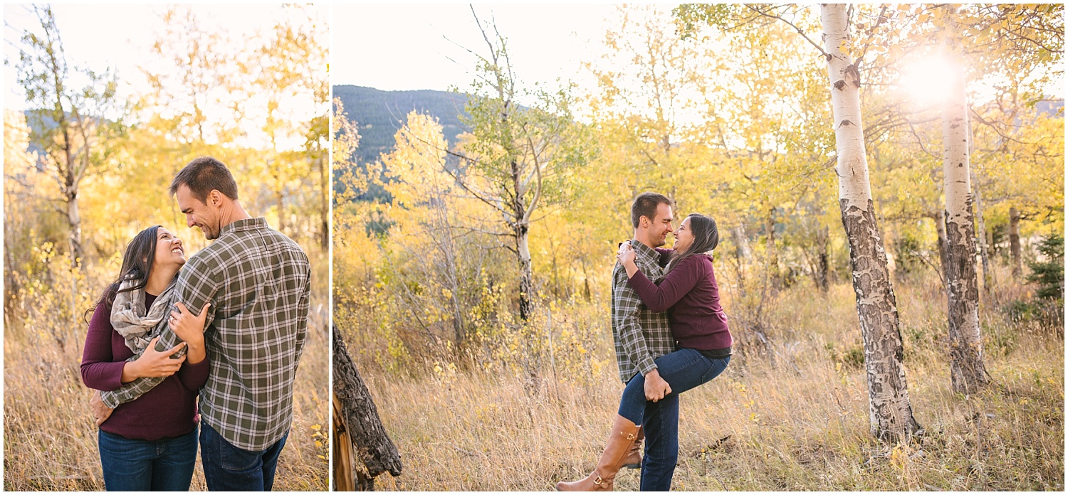 Engaged couple playing in the yellow aspen tree grove in Endovalley of RMNP for fall engagement