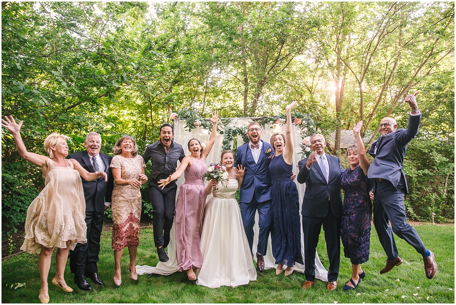 Family cheers for bride and groom who married in backyard in light of coronavirus