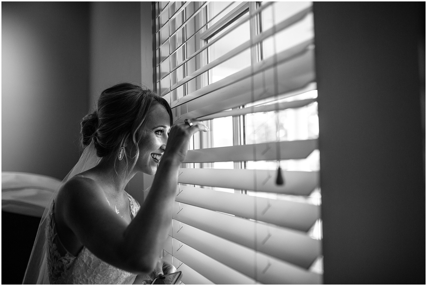 Bride waiting for the summer thunder storm to stop before wedding ceremony at Cordera in Colorado Springs