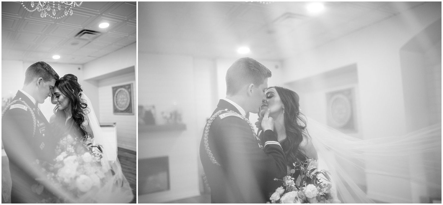 Black and white bride and groom portraits through the bride's veil