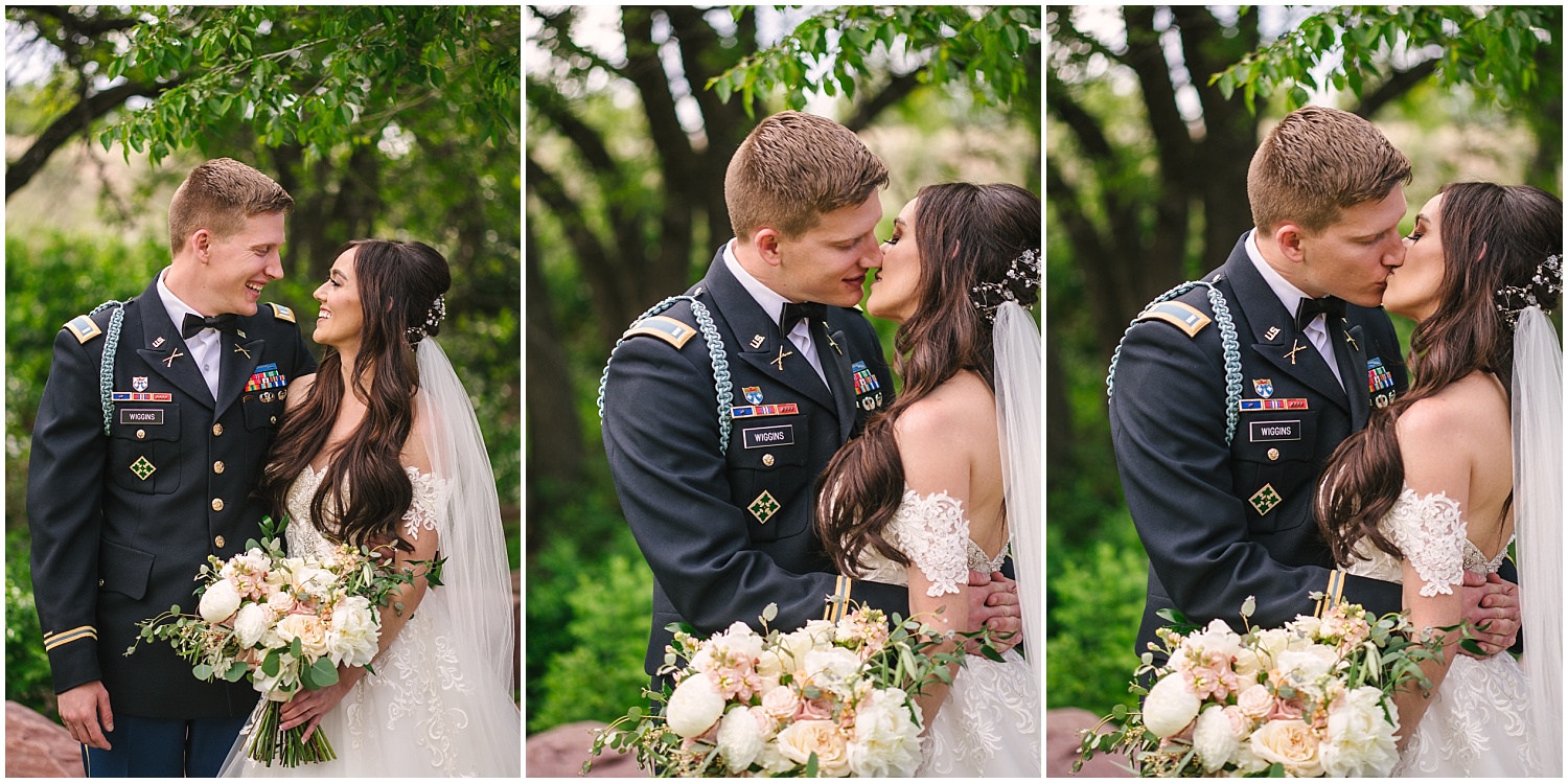 Bride and groom kissing in the trees at military wedding at Creekside Event Center in Colorado Springs