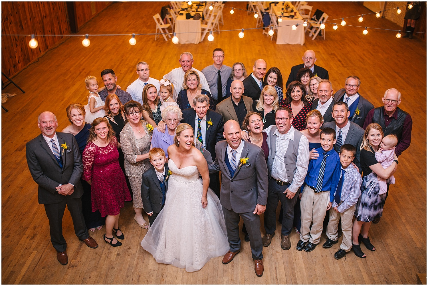 Big group photo of all the guests at Rustic Lace Barn wedding