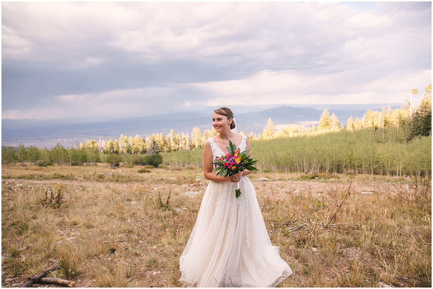 Bridal portrait with sweeping landscape views from the Sandia Mountains outside Albuquerque