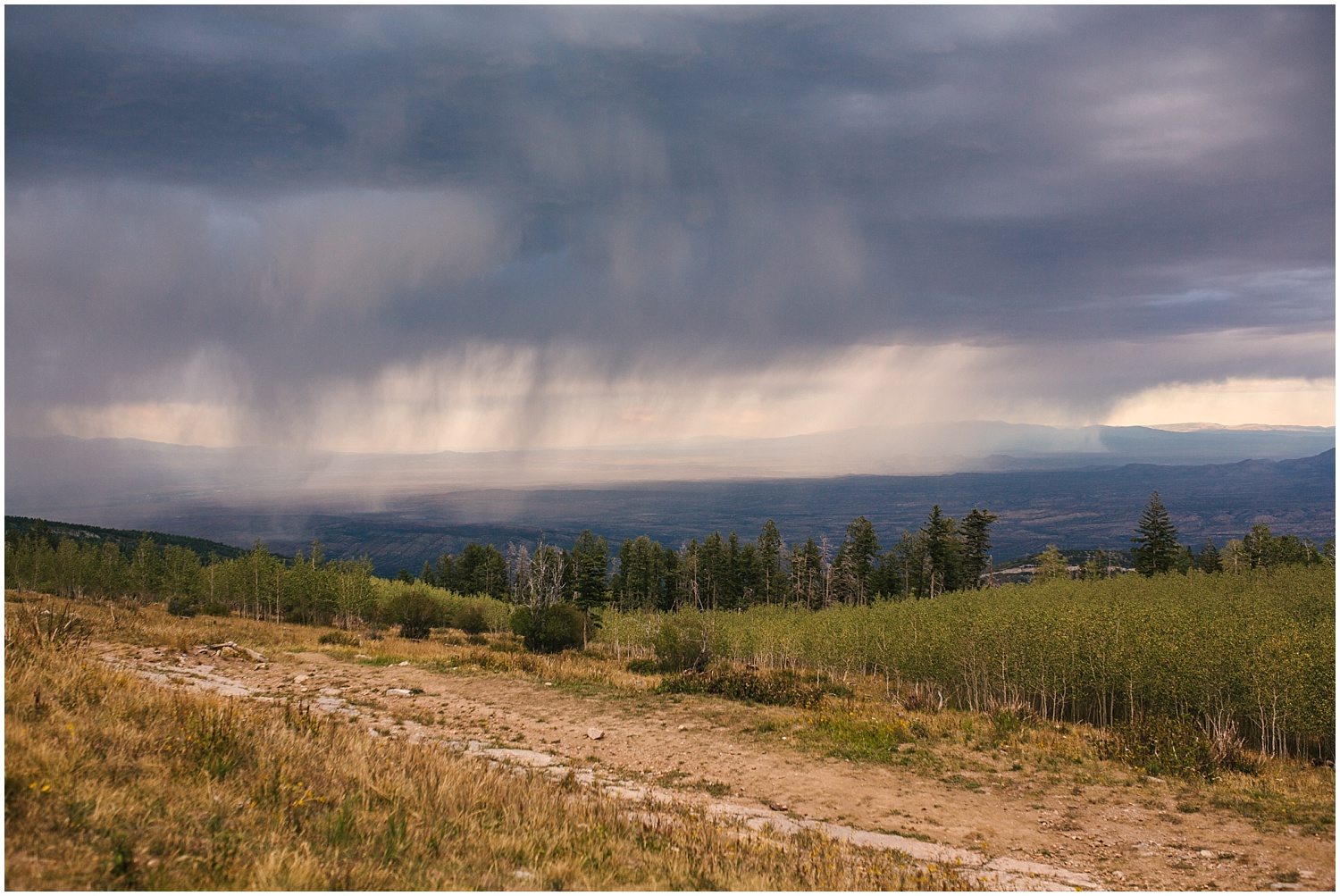 summer storm clouds rolling in over Sandia Mountains outside Albuquerque, New Mexico