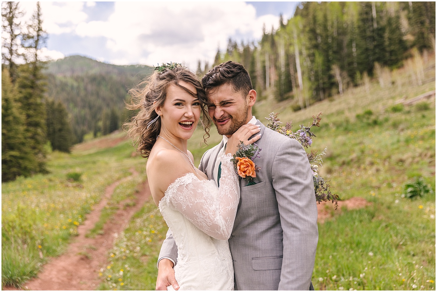Silly bride and groom portraits in a field at Telluride wedding