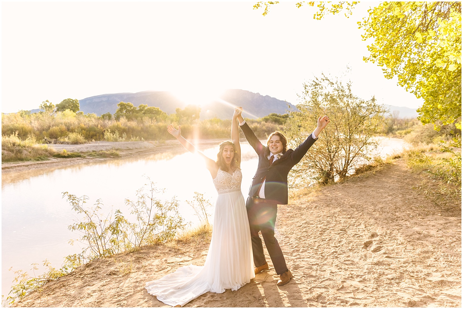 Bride and groom celebrating at sunrise elopement in Albuquerque New Mexico