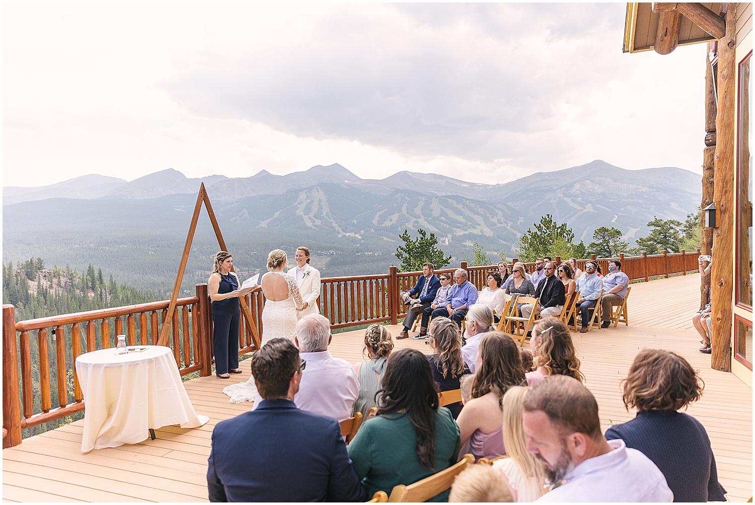 Summer mountain wedding ceremony with two brides at the Lodge at Breckenridge