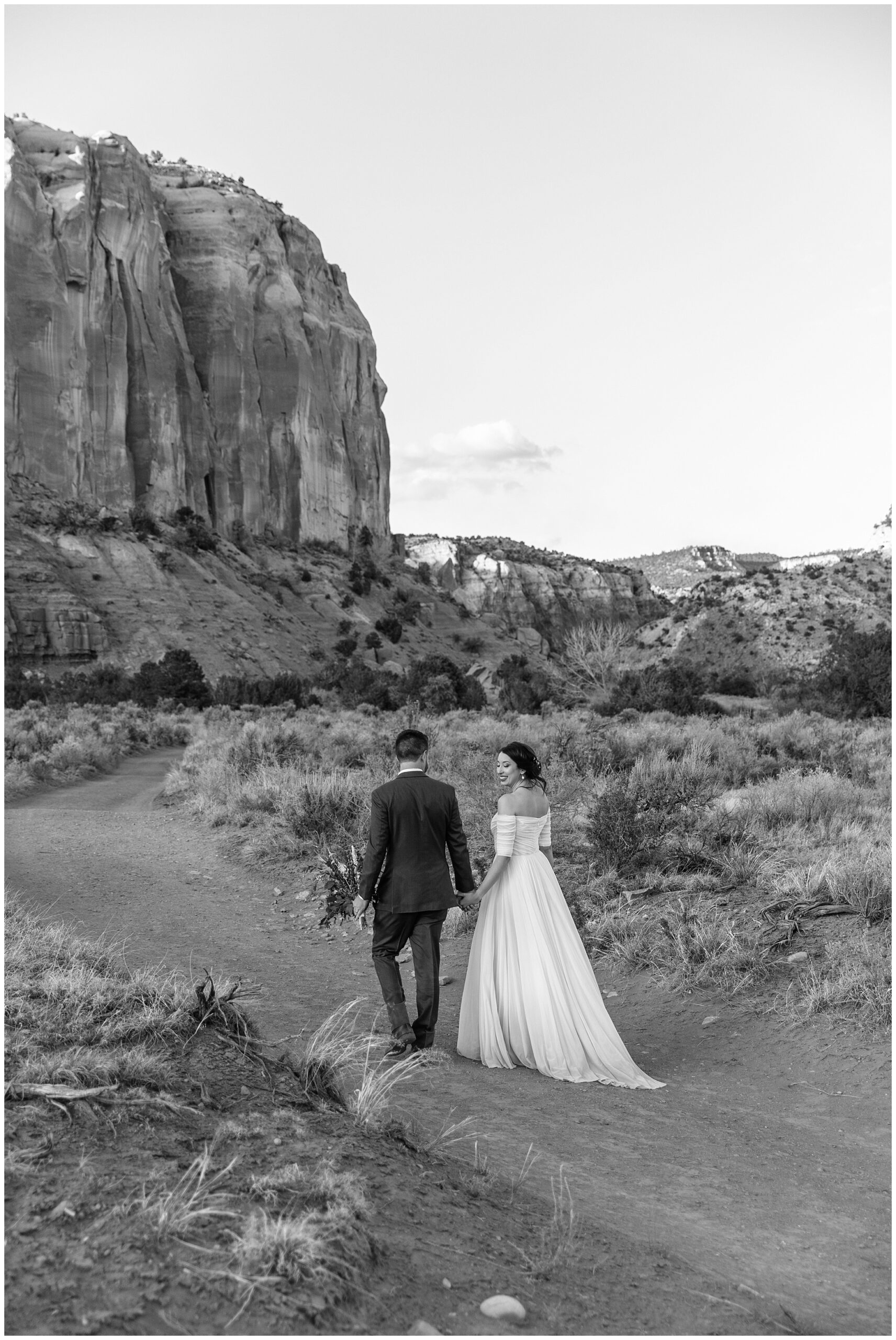 bride and groom in black and white at Georgia O'Keeffe's Ghost Ranch wedding venue