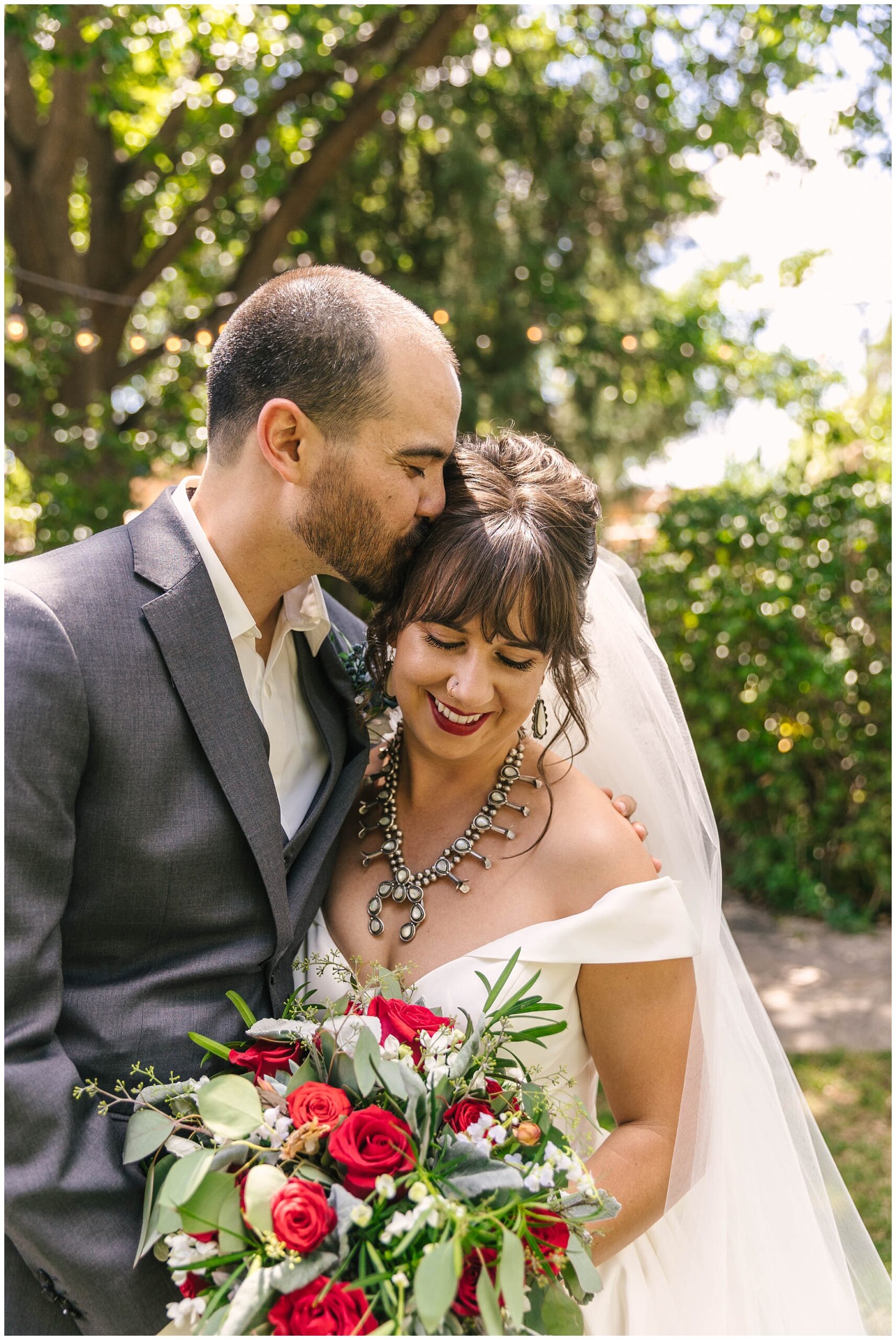 bride wearing squash blossom necklace in New Mexico style at Old Town Albuquerque wedding