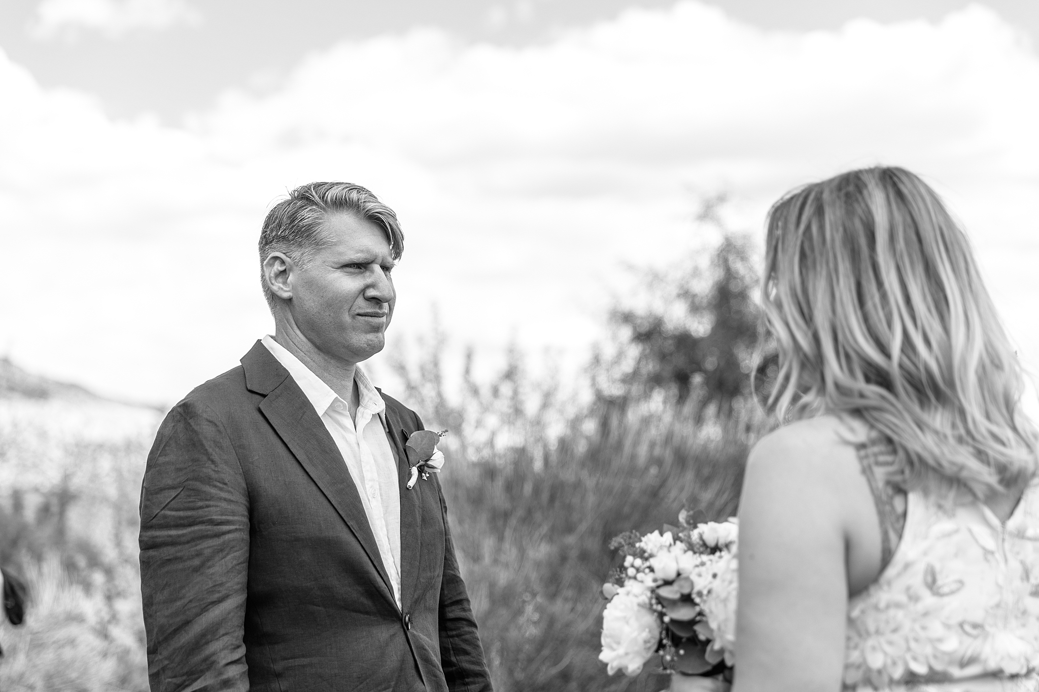 couple reading wedding vows at Abiquiu New Mexico elopement ceremony