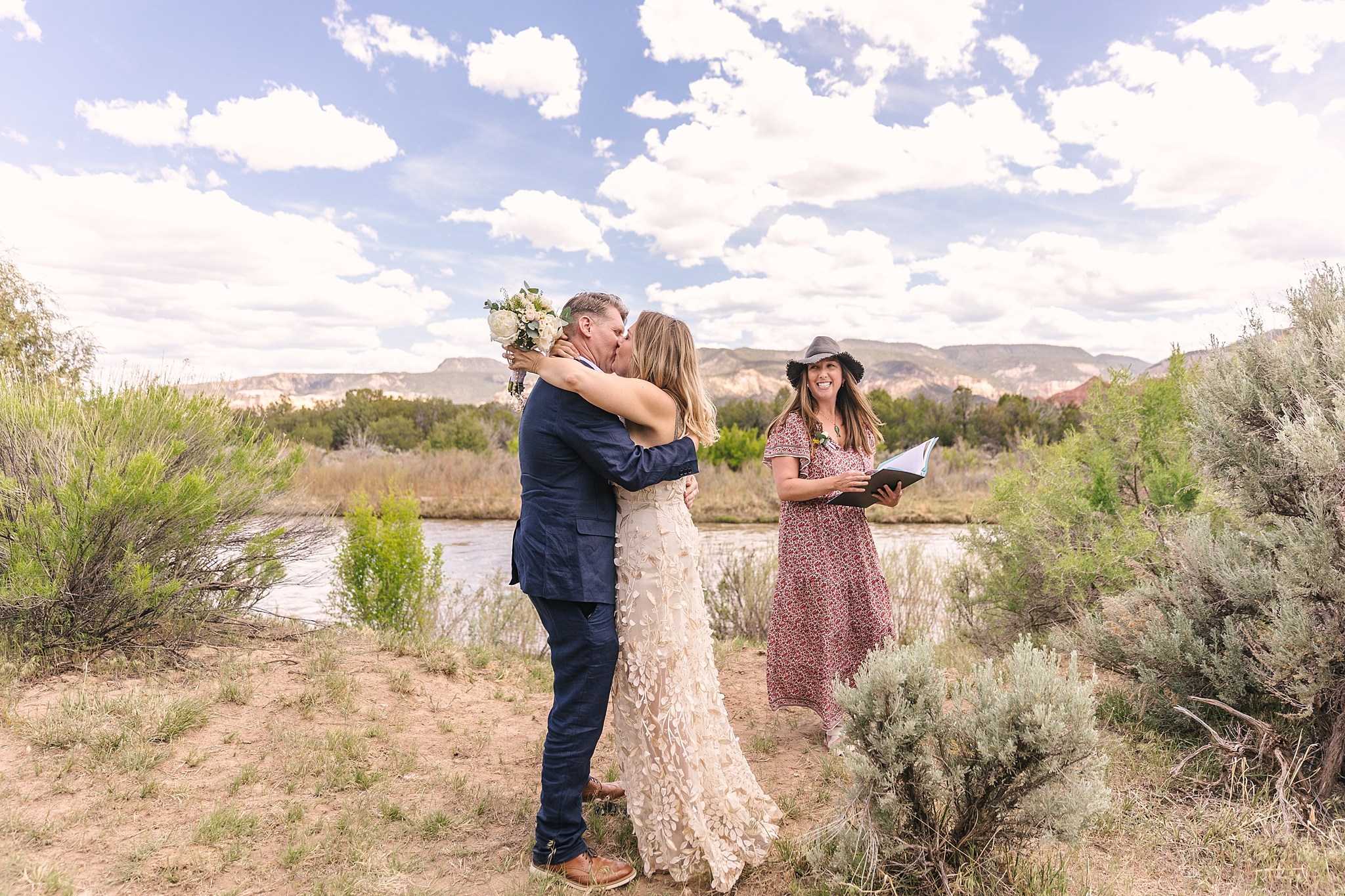 couples first kiss at Abiquiu New Mexico elopement ceremony