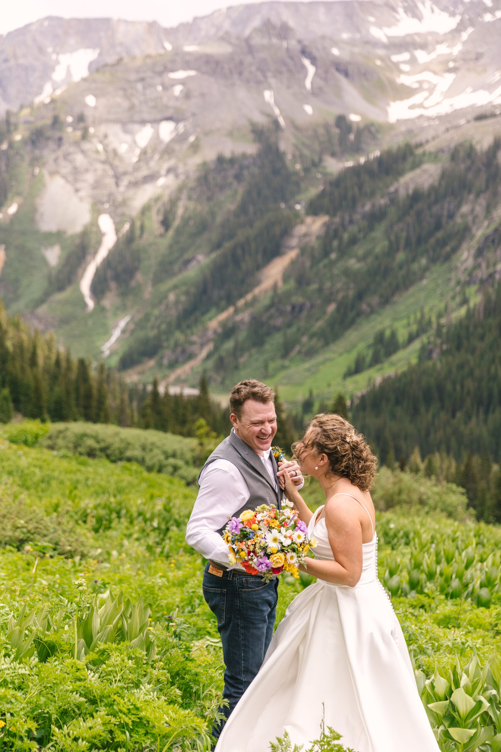 couple laughing at mountain elopement in Ouray, Colorado
