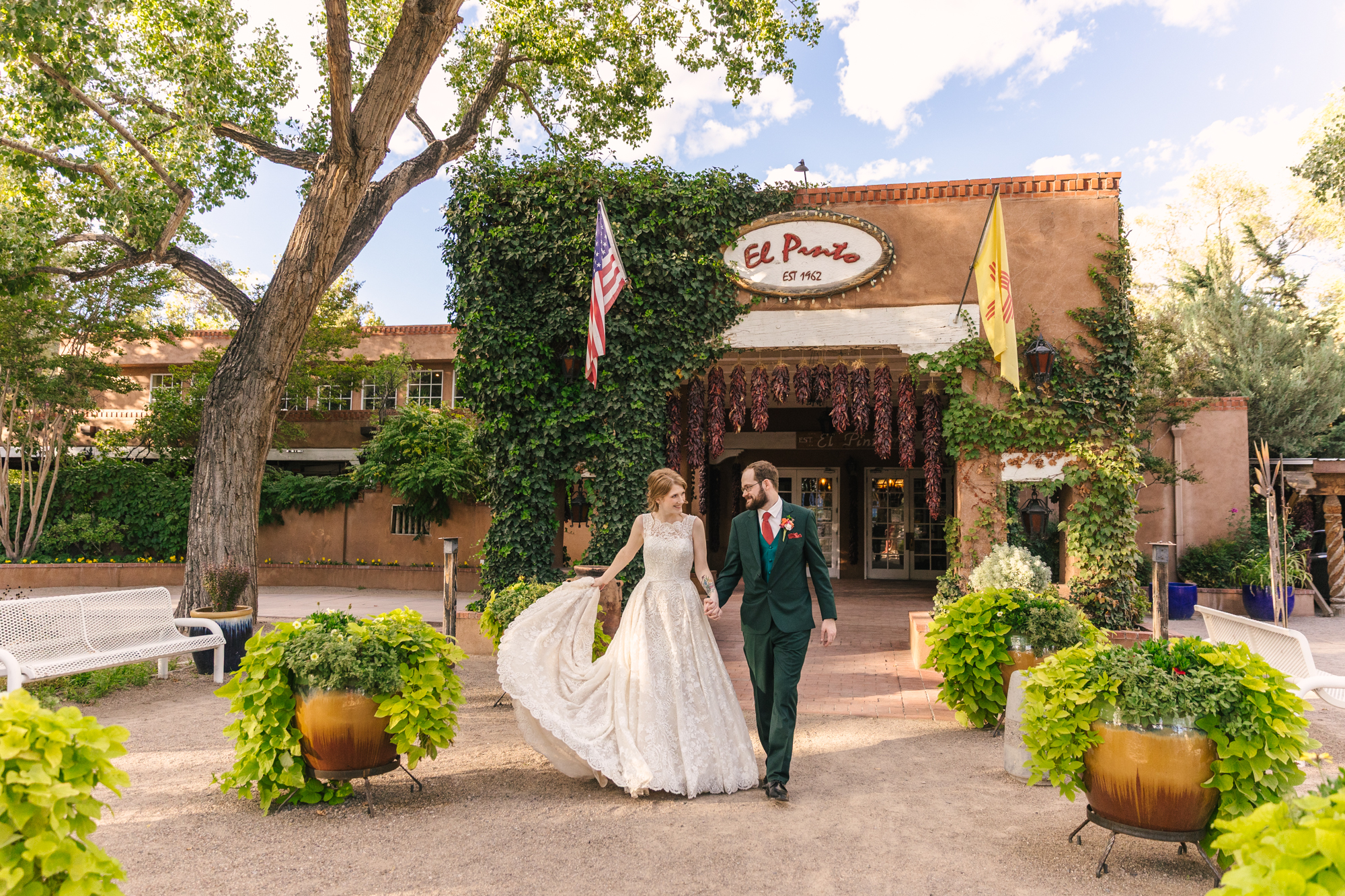 wedding portraits of bride and groom with iconic El Pinto Restaurant sign