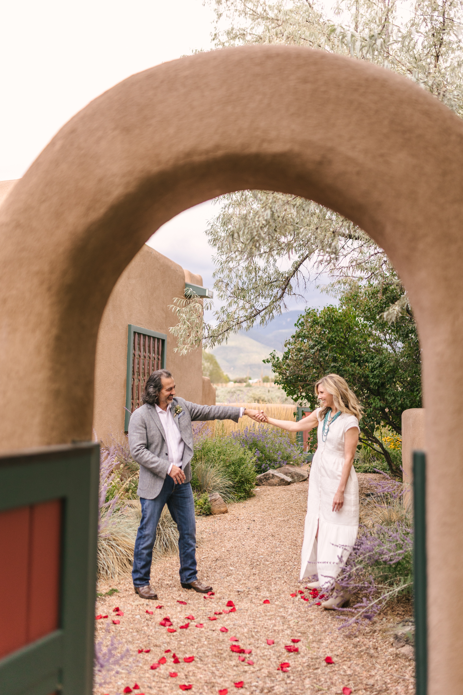 bride and groom dancing at adobe home wedding in Taos New Mexico