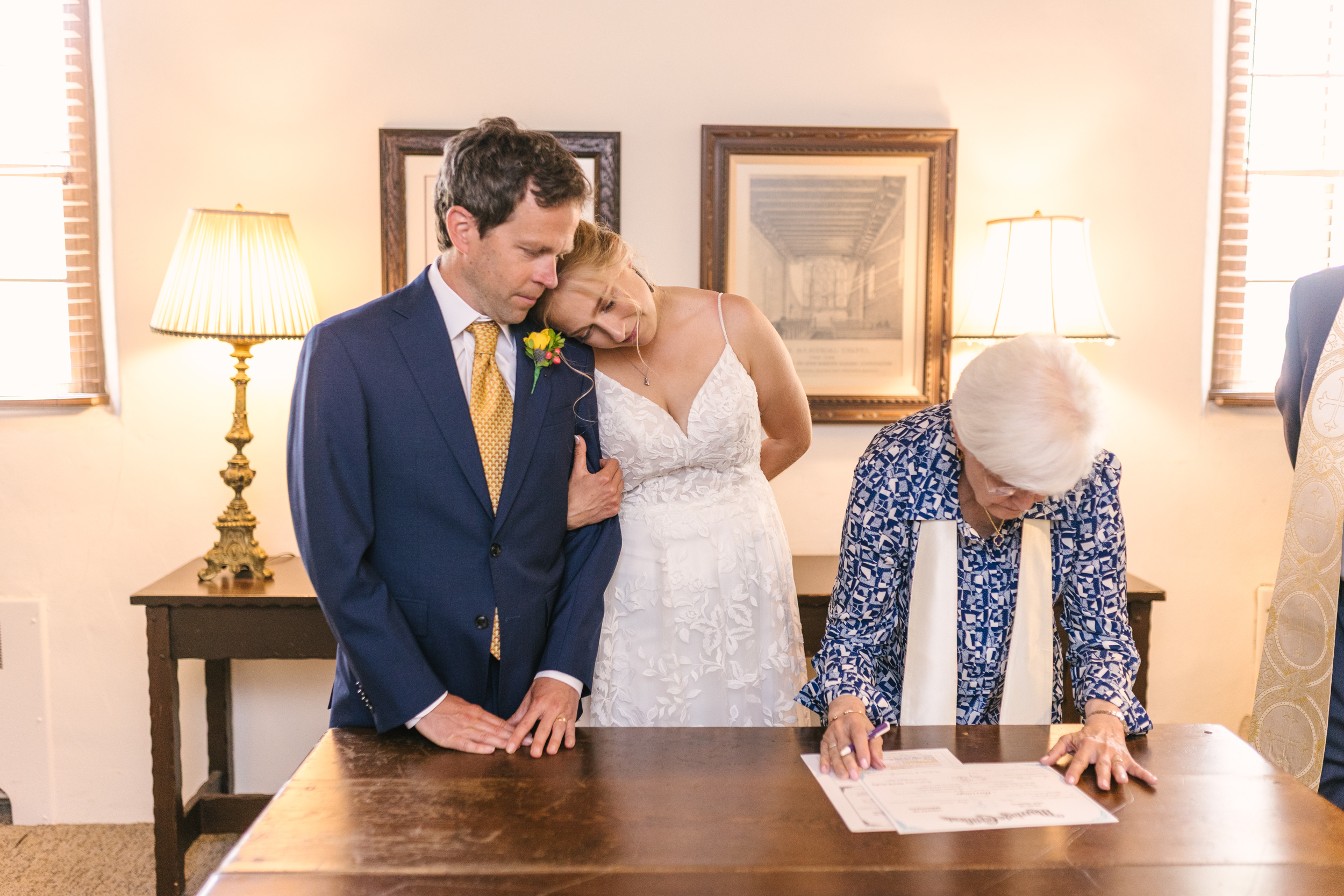 signing the marriage license at UNM Alumni Chapel