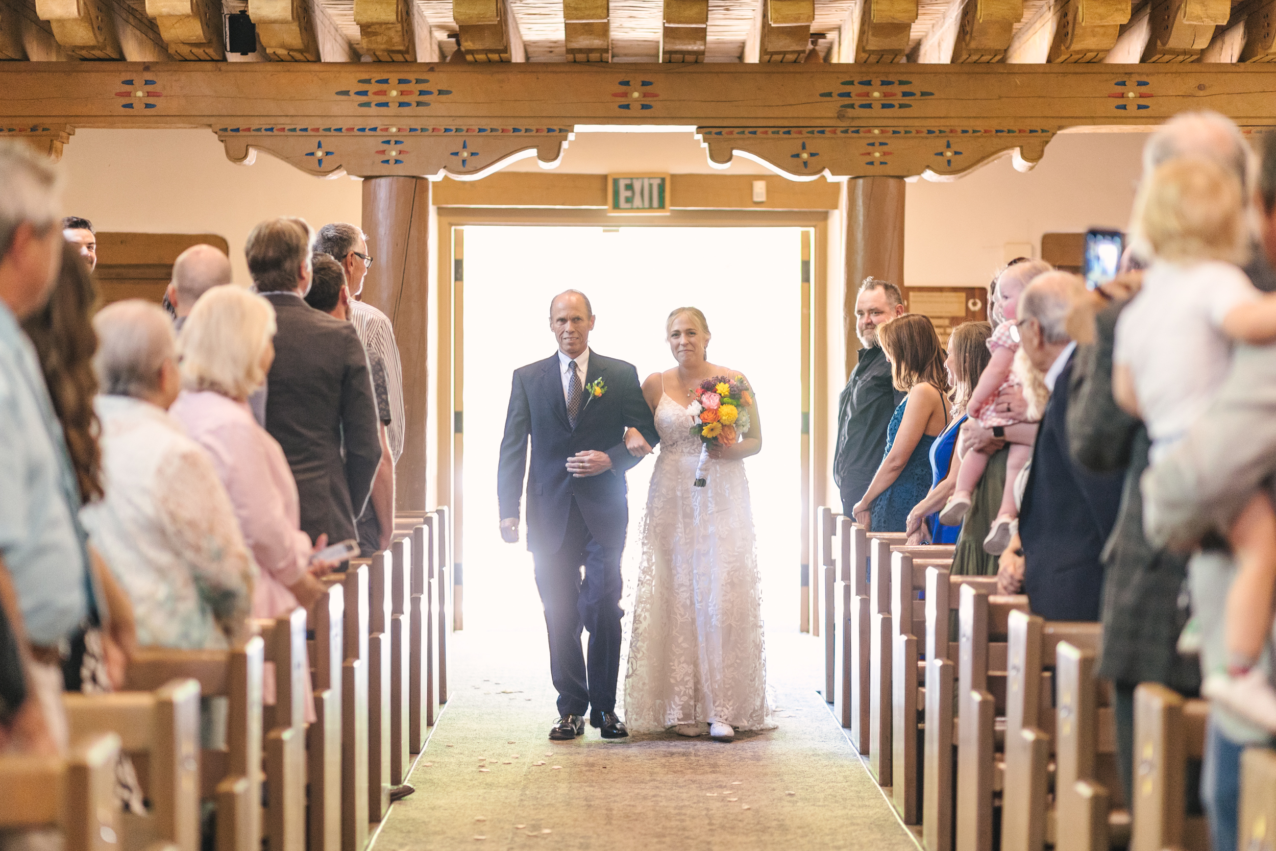bridal entrance to UNM Alumni Chapel wedding ceremony