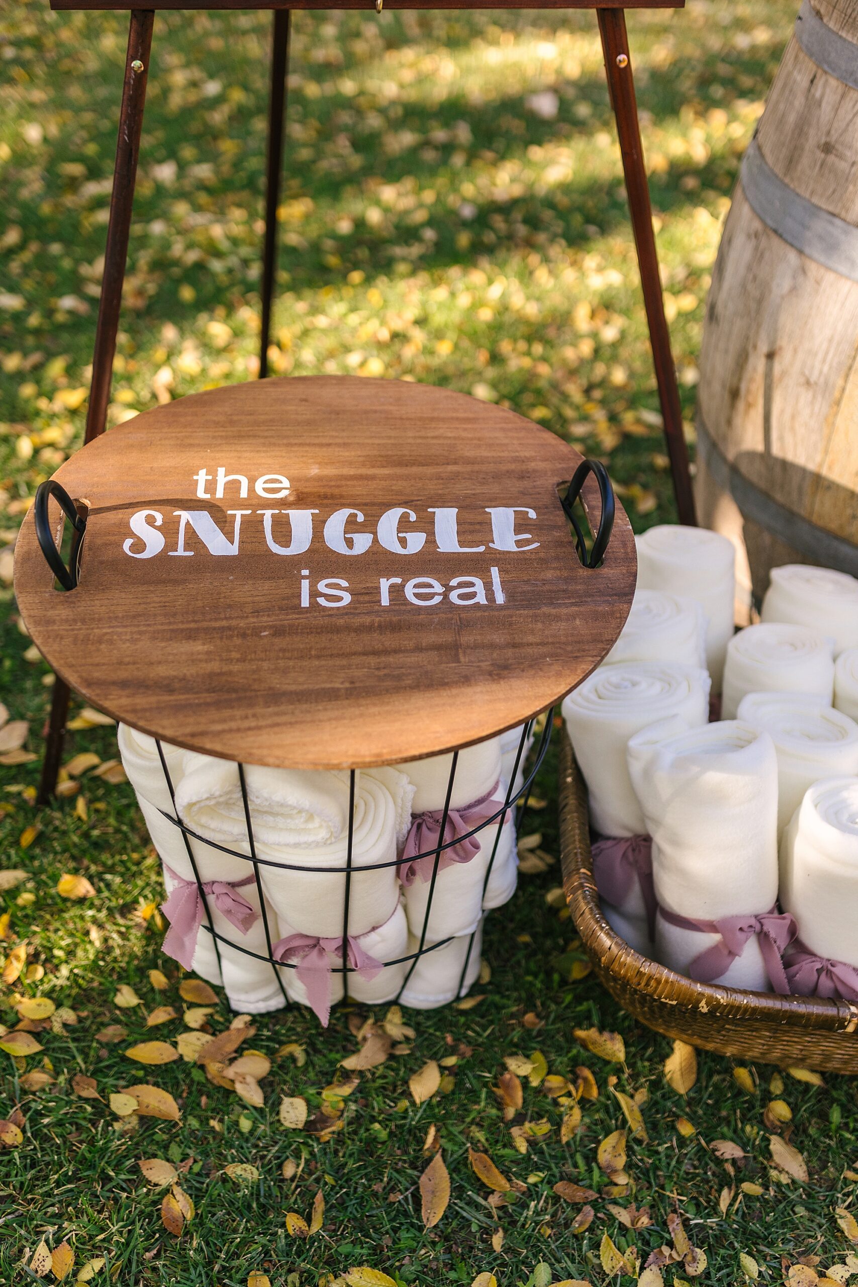 blankets for guests at an outdoor fall wedding ceremony