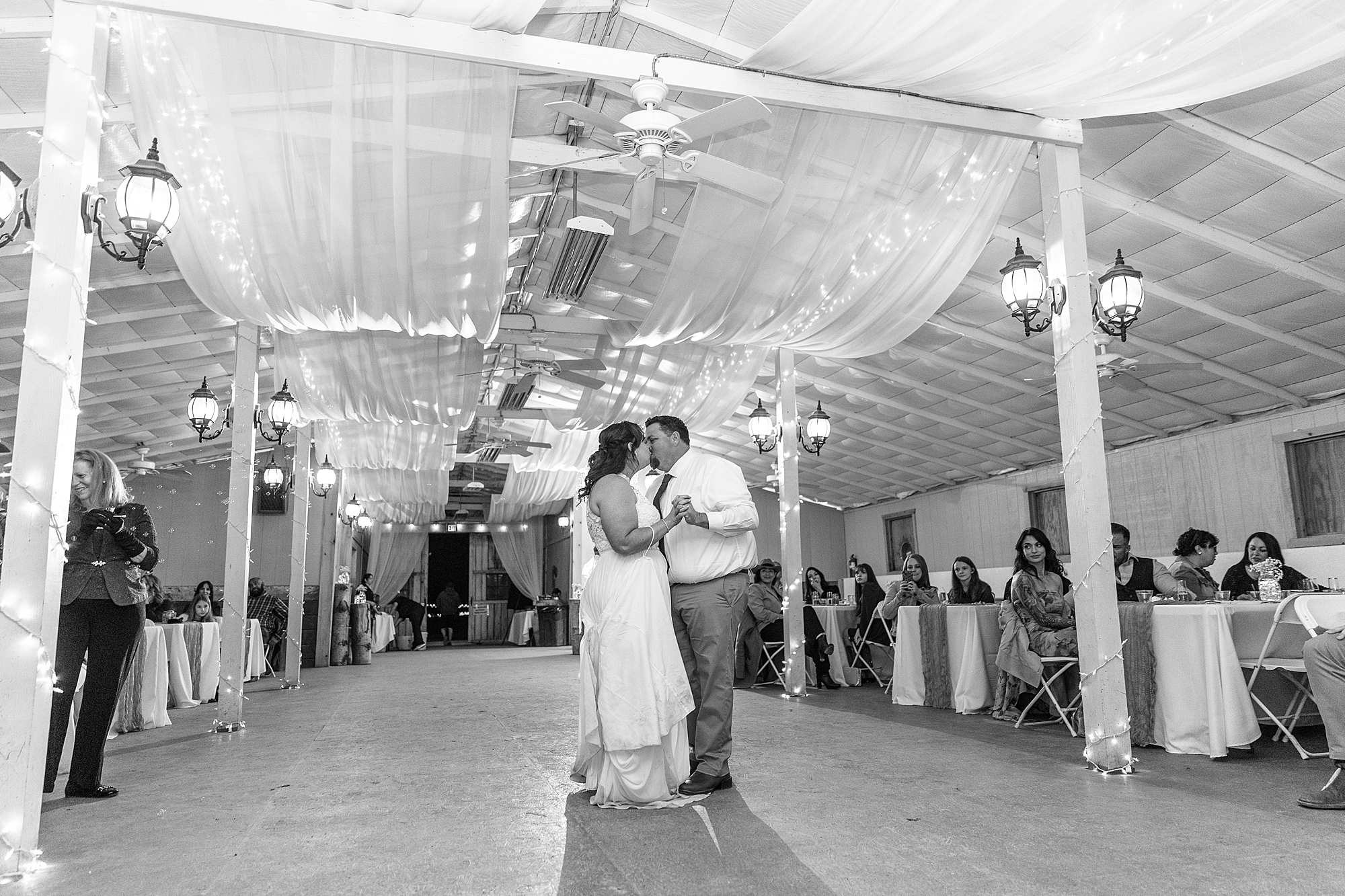 bride and groom first dance in the barn at Old Town Farm wedding