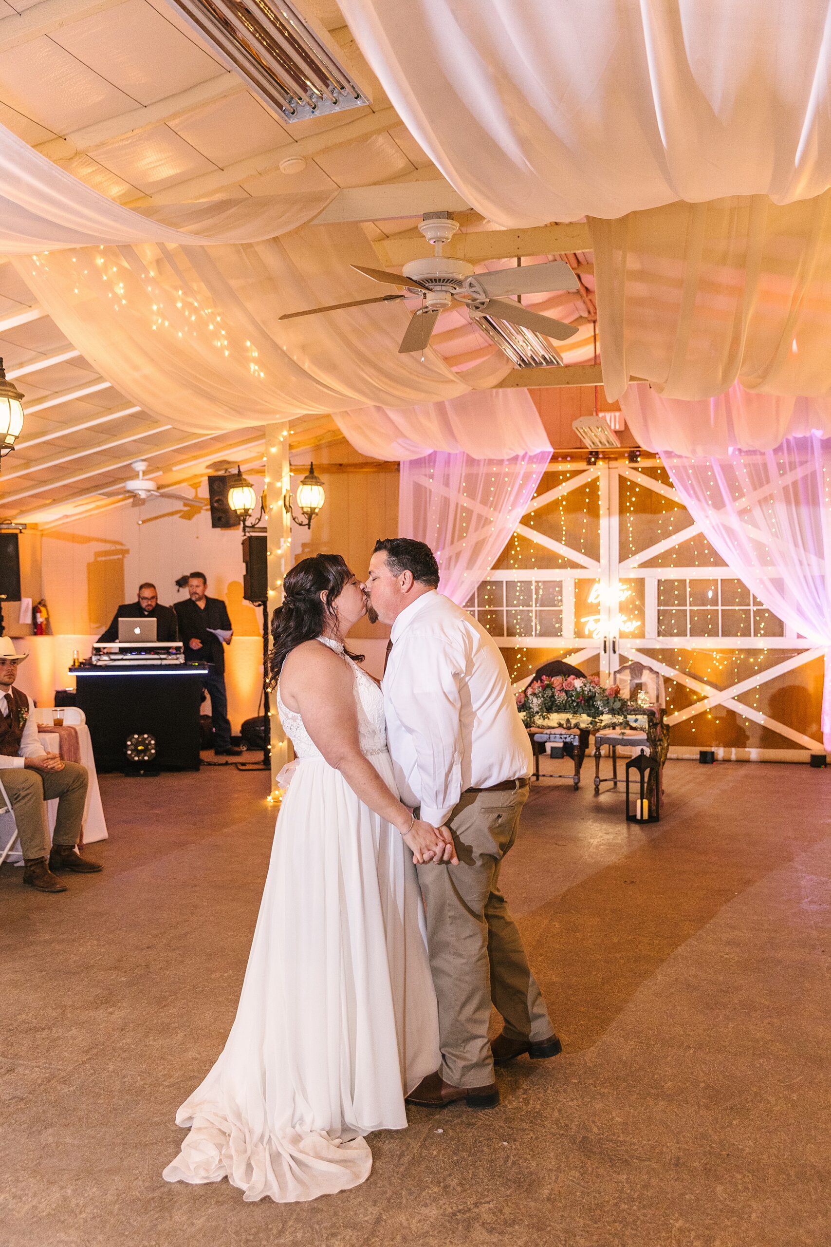 bride and groom first dance in the barn at Old Town Farm wedding