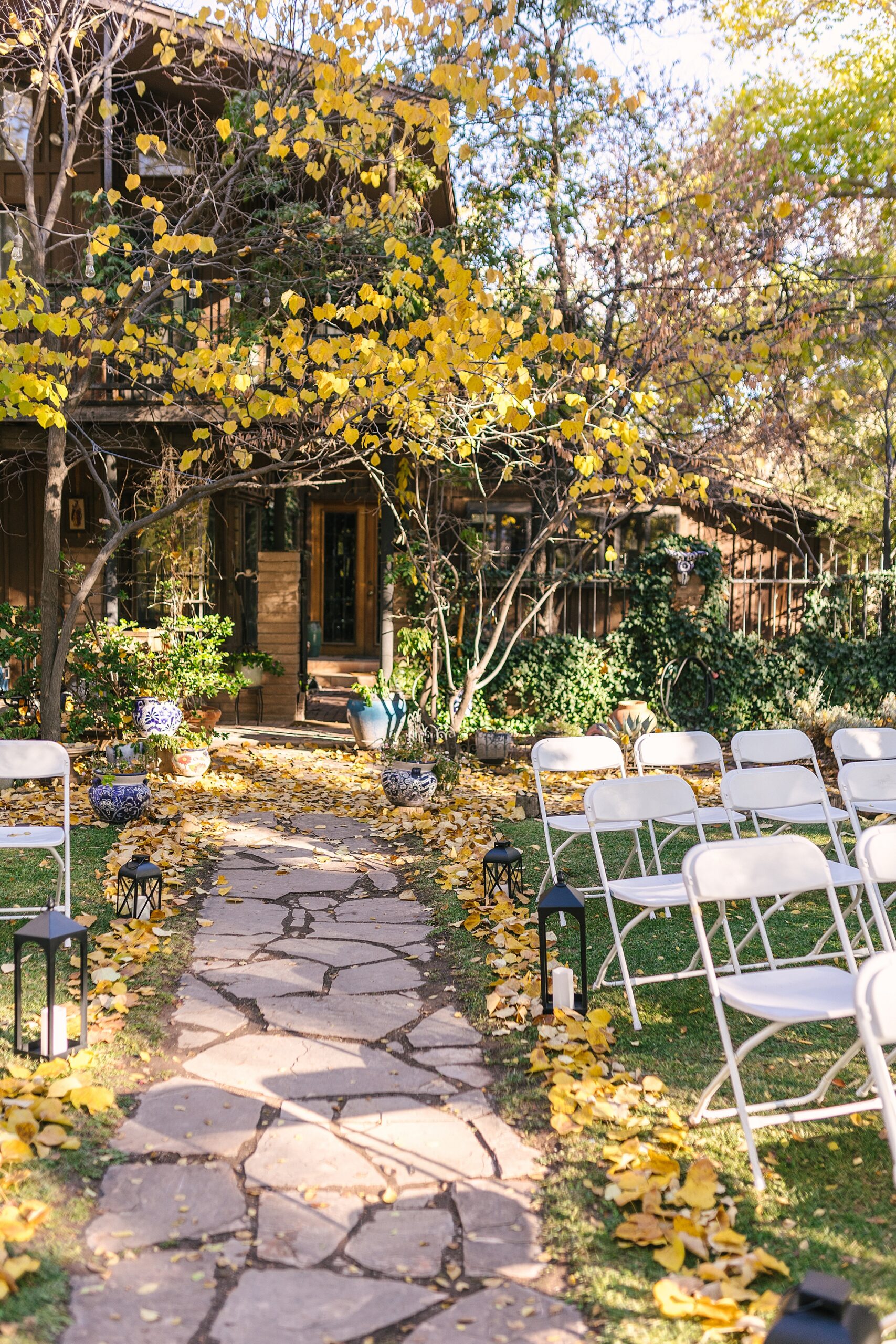 fall wedding ceremony under the cottonwoods at Old Town Farm wedding venue in Albuquerque