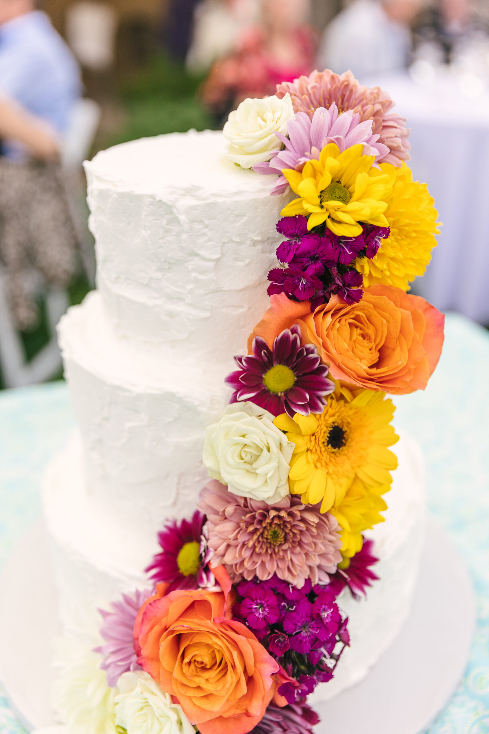 vibrant florals for wedding cake