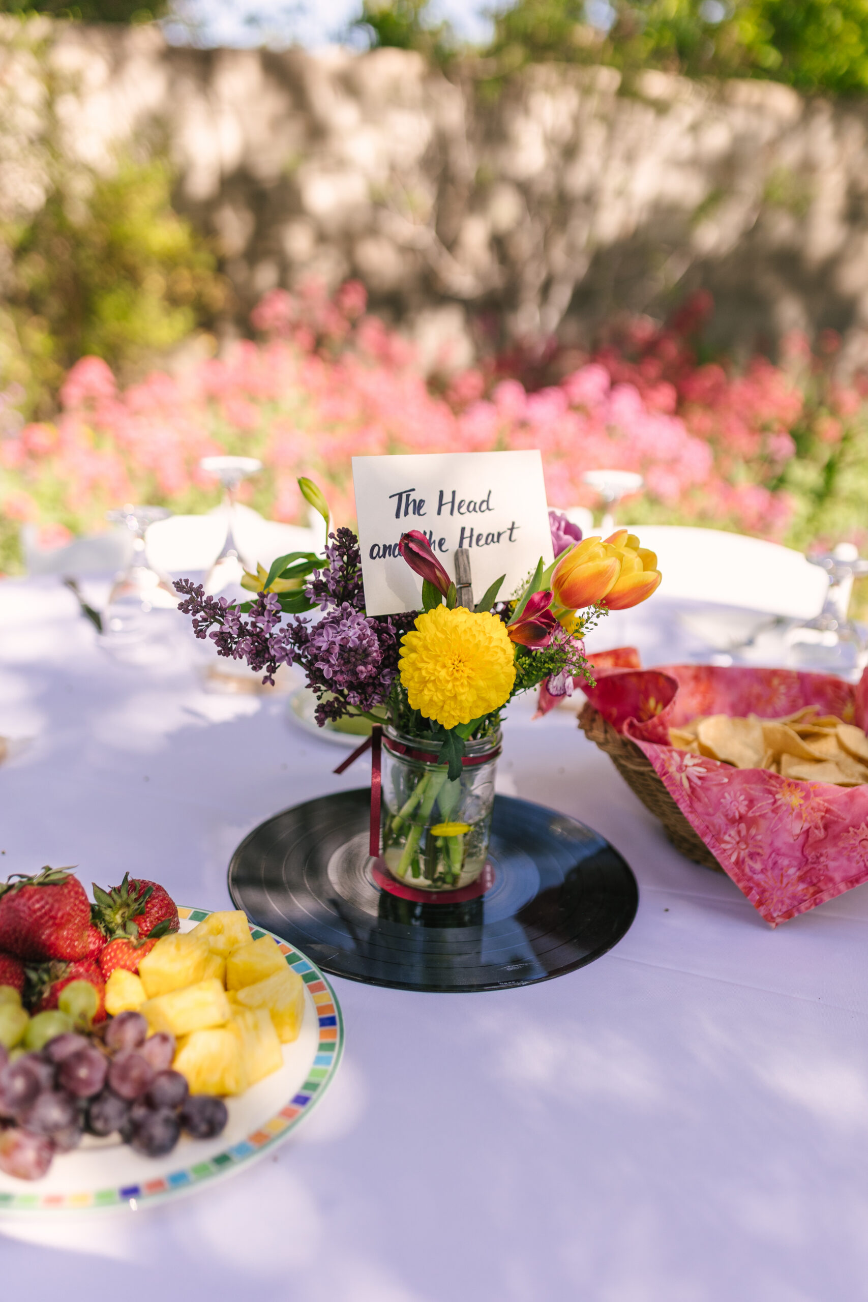 vibrant flowers and fruit plate for spring wedding