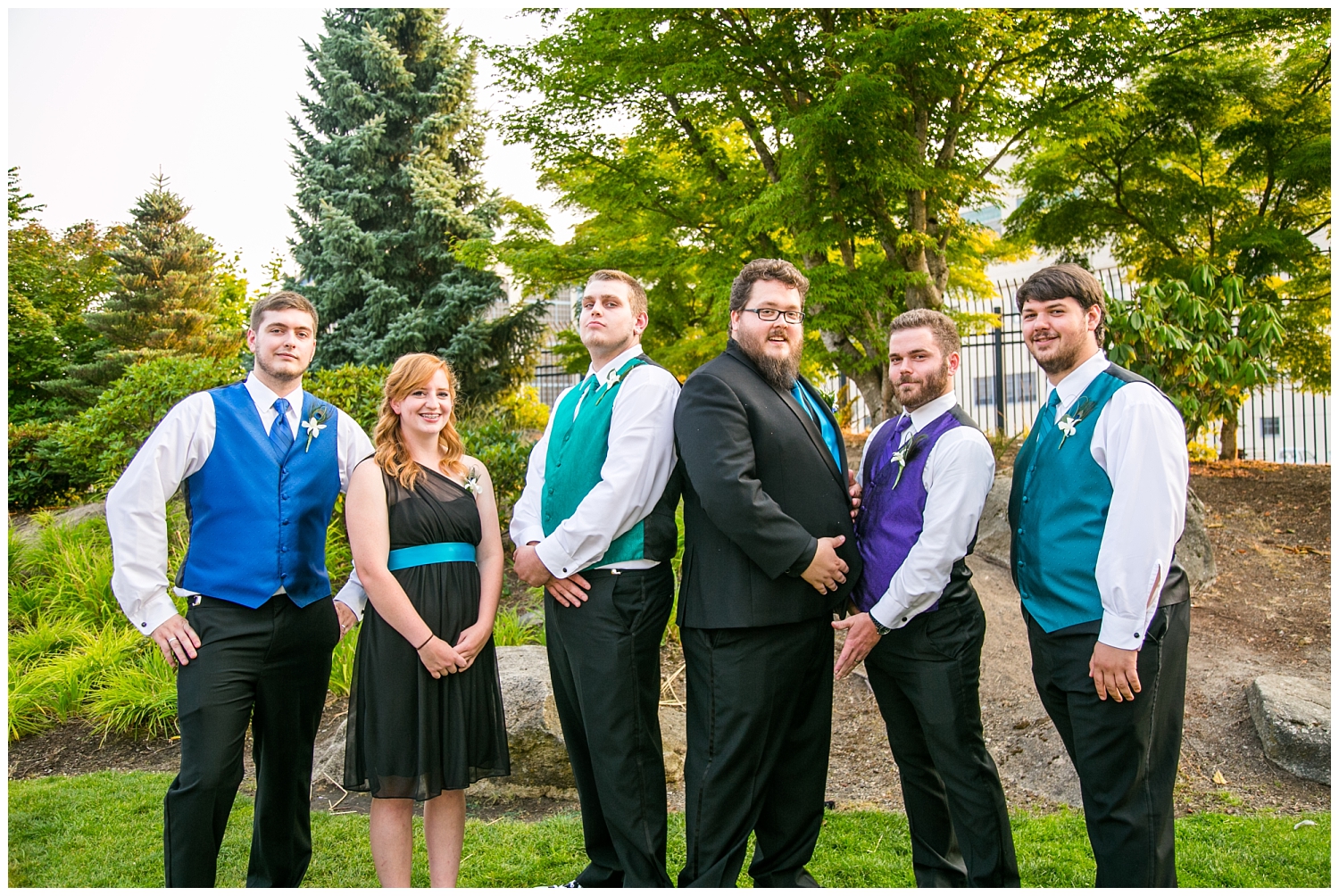 colorful bridal party portraits at peacock-themed Kitsap Conference Center wedding,