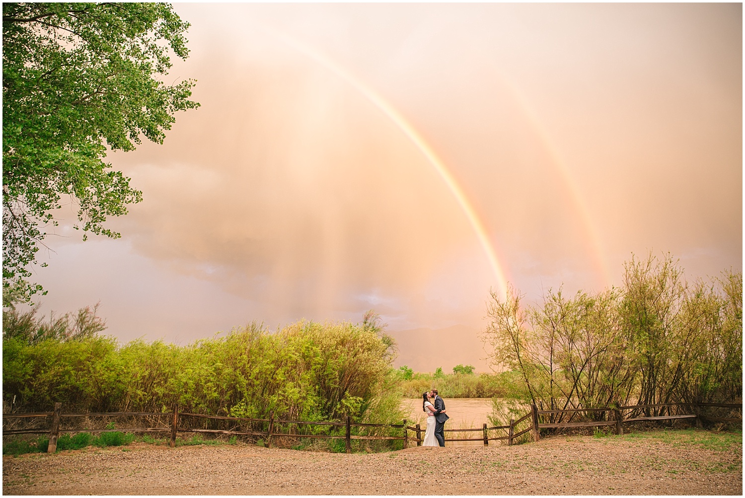 Double rainbow over bride and groom at Hyatt Regency Tamaya wedding in New Mexico