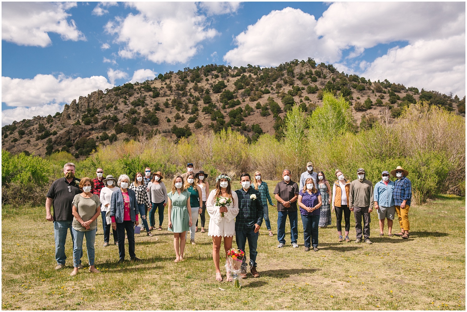 Everyone in masks at campsite elopement in backcountry Rio Grande National Forest