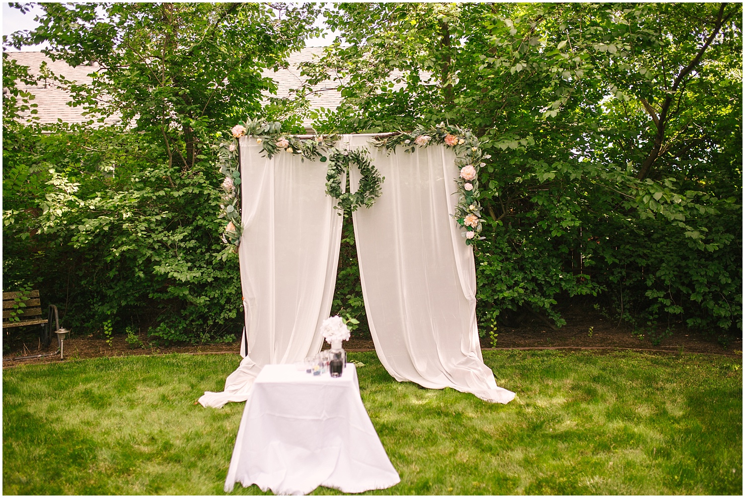 Backyard wedding ceremony arch