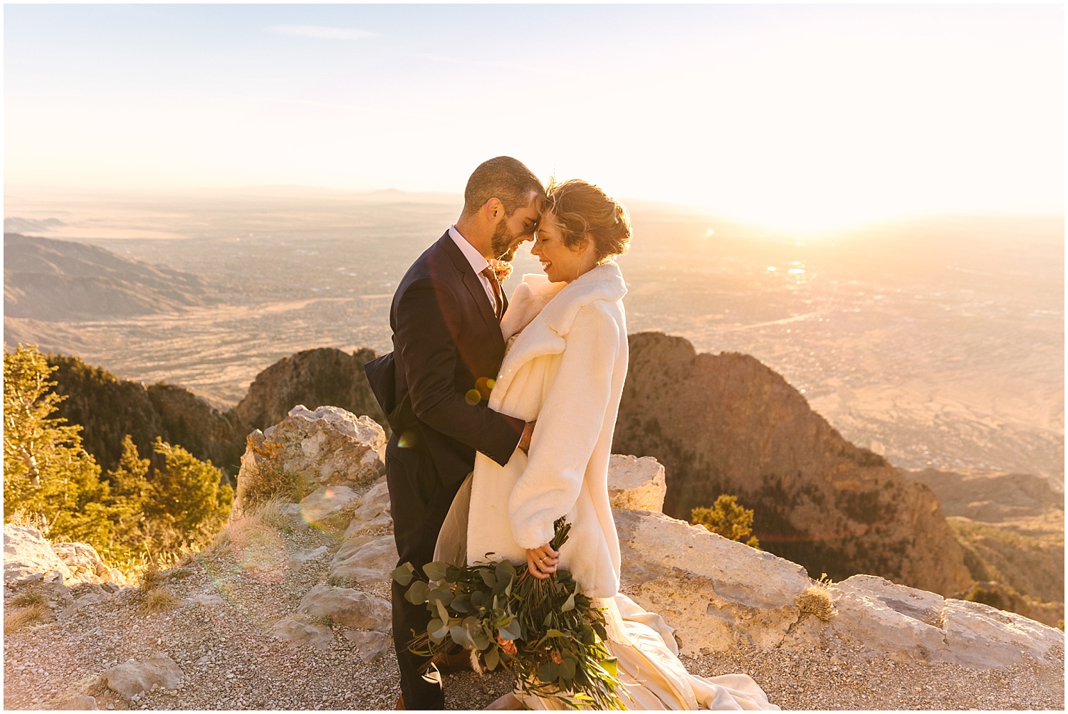 Bride and groom romantic sunset portraits at Sandia Crest