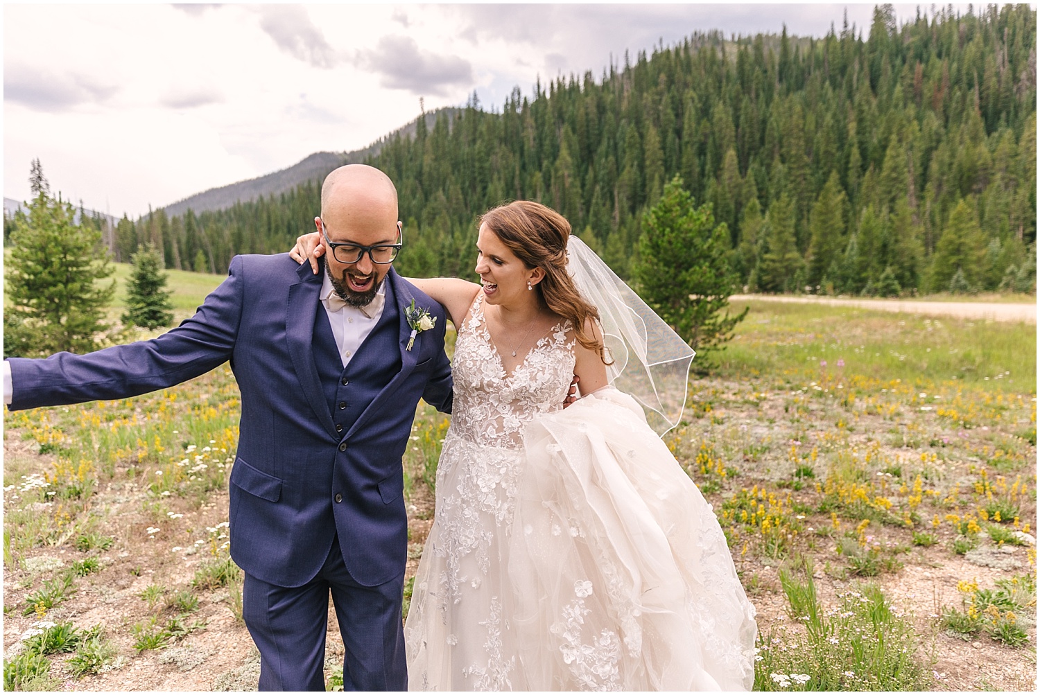 Silly portraits of bride and groom in the mountains of Berthoud Pass Colorado